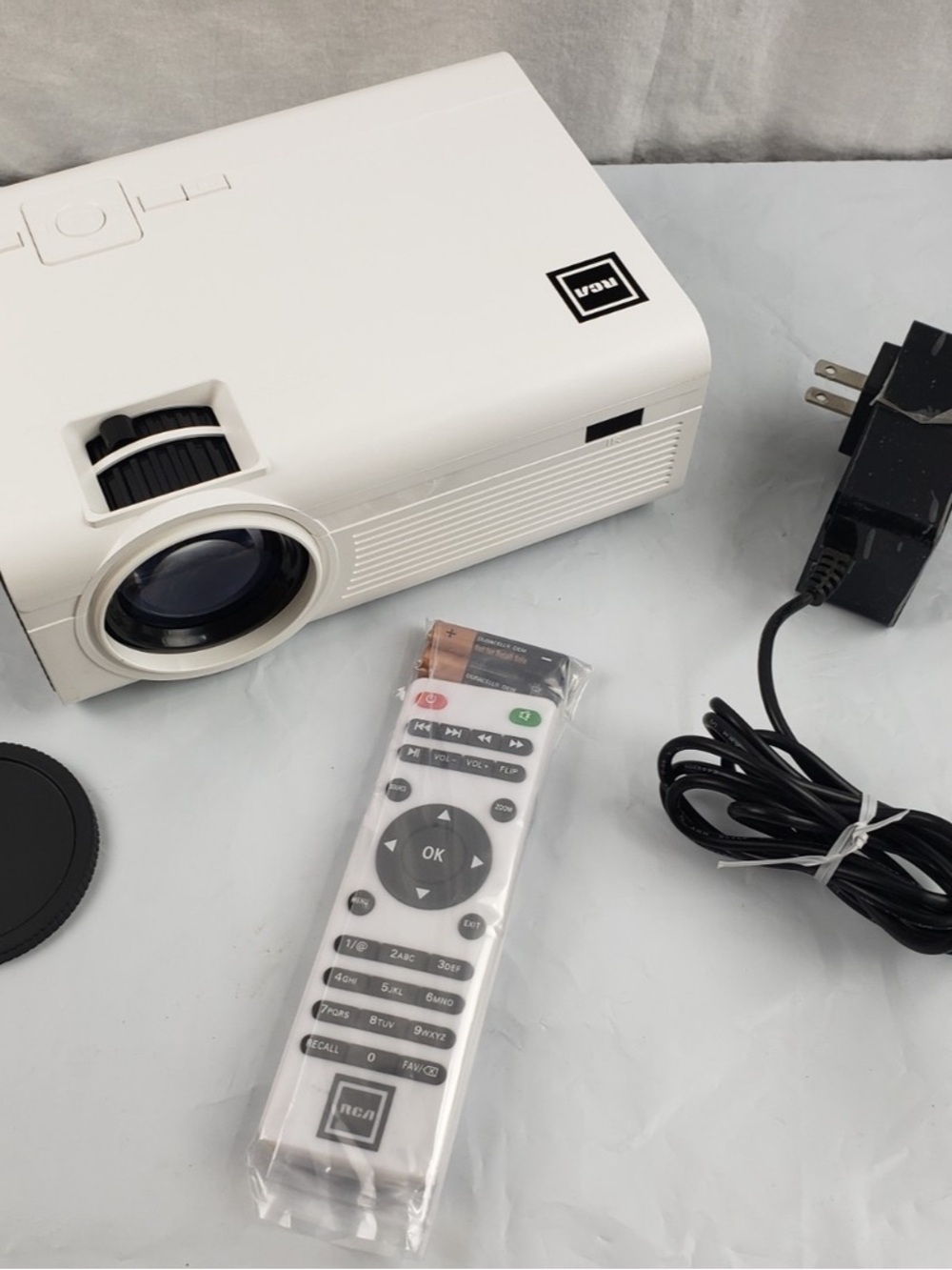 RCA White Portable Mini Projector with Remote